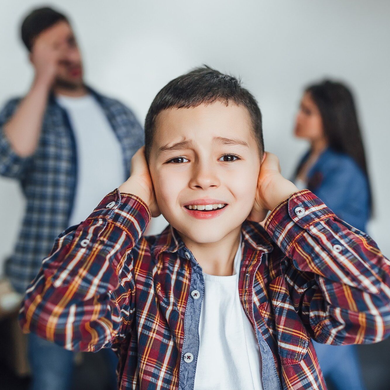 small-boy-listening-quarrel-parents_496169-639